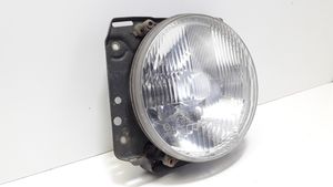 Volkswagen Golf II Lampa przednia 111941605A