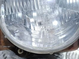 Volkswagen Golf II Lampa przednia 310115367