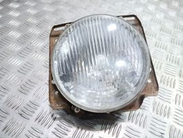 Volkswagen Golf II Lampa przednia 310115367