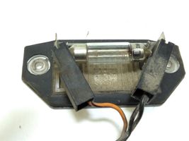 Ford Mondeo Mk III Lampa oświetlenia tylnej tablicy rejestracyjnej 1S7113550AC