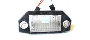 Ford Mondeo Mk III Lampa oświetlenia tylnej tablicy rejestracyjnej 1S7113550AC