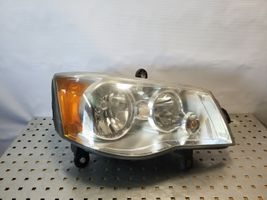 Chrysler Grand Voyager V Lampa przednia 05113340AD