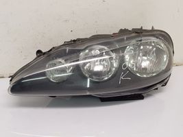 Alfa Romeo 147 Lampa przednia 89101232SX