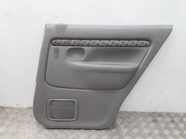 Mazda Demio Boczki / Poszycie drzwi tylnych D28068520