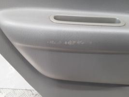 Mazda Demio Rivestimento del pannello della portiera posteriore D28068550