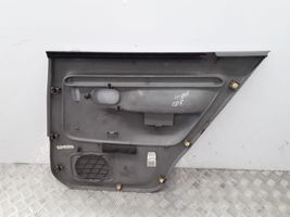 Mazda Demio Garniture panneau de porte arrière D28068550