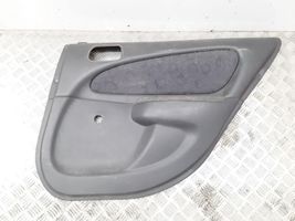 Toyota Corolla E110 Rivestimento del pannello della portiera posteriore 6777512030