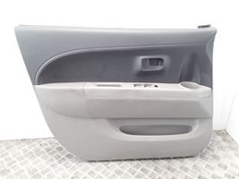 Daihatsu Sirion Rivestimento del pannello della portiera anteriore 67070B1010