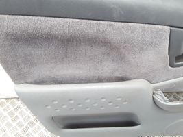 Toyota Yaris Verso Rivestimento del pannello della portiera anteriore D761215000