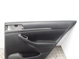 Toyota Avensis T250 Rivestimento del pannello della portiera posteriore 6763005A30B0