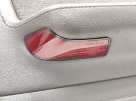 Mazda 929 Rivestimento del pannello della portiera anteriore 