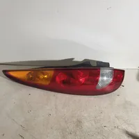 Nissan Almera Tino Aizmugurējais lukturis virsbūvē E95251