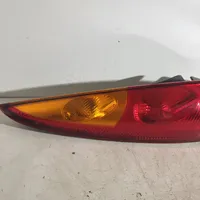 Nissan Almera Tino Aizmugurējais lukturis virsbūvē E95251