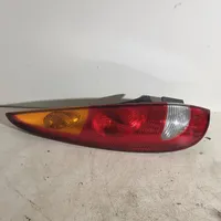 Nissan Almera Tino Aizmugurējais lukturis virsbūvē E95251