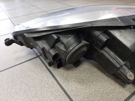 Volkswagen Golf V Lampa przednia 1K6941006P