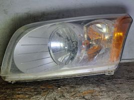 Dodge Caliber Lampa przednia 05303741AI