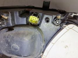 Chrysler Voyager Lampa przednia 084331105L