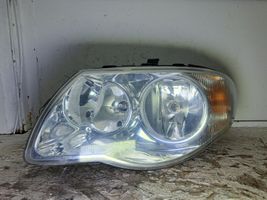 Chrysler Voyager Lampa przednia 084331105L