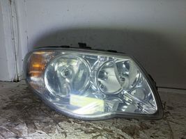 Chrysler Voyager Lampa przednia 04857830AC