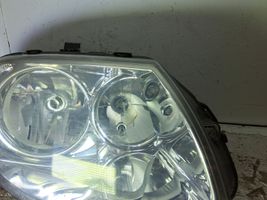 Chrysler Voyager Lampa przednia 04857830AC