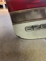 Mazda 626 Listwa oświetlenie tylnej tablicy rejestracyjnej 0431394