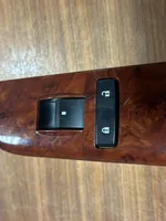 Chevrolet Tahoe Front door window switch trim 20877339AA