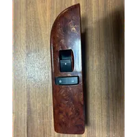 Chevrolet Tahoe Front door window switch trim 20877339AA