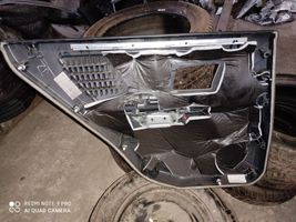 Cadillac SRX Takaoven verhoilu 