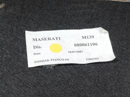 Maserati Quattroporte Tavaratilan/takakontin alempi sivuverhoilu 080061106