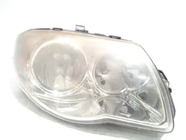 Chrysler Voyager Lampa przednia 04857830AC