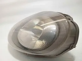 Opel Vivaro Lampa przednia 7700311371