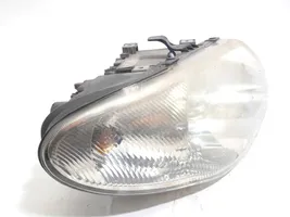 Chrysler Voyager Lampa przednia 04857830AC