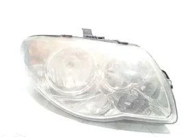 Chrysler Voyager Lampa przednia 04857830AC