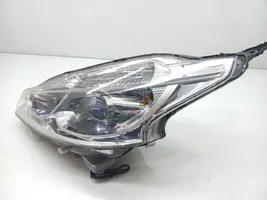 Peugeot 208 Lampa przednia 9802221880