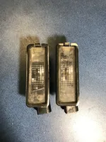 Volkswagen Golf VII Lampa oświetlenia tylnej tablicy rejestracyjnej 1K8943021