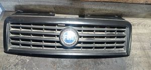 Fiat Doblo Front bumper upper radiator grill 735395576