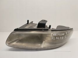Chrysler Voyager Lampa przednia 04897389AC