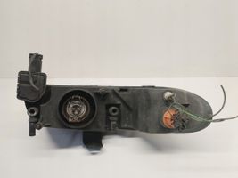 Chrysler Voyager Lampa przednia 04897389AC