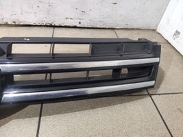 Volkswagen Touareg II Front bumper upper radiator grill 7P6853651A