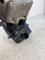 Volkswagen Golf V Eļļas filtra turētājs / dzesētājs 06F115397H