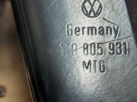 Volkswagen Caddy Uchwyt / Mocowanie lampy przedniej 1T0805931
