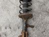 Front shock absorber with coil spring 