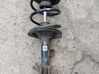 Front shock absorber with coil spring 