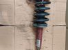 Front shock absorber with coil spring 8E0413031CL