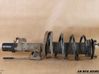 Front shock absorber with coil spring 
