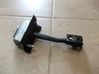 Front door check strap stopper 
