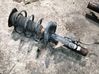 Front shock absorber with coil spring 
