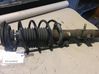 Front shock absorber with coil spring 