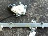 Regulador de puerta delantera con motor 