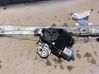 Regulador de puerta delantera con motor 